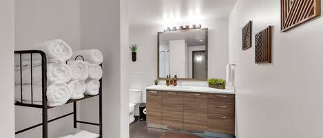 Shower, hair dryer, towels, soap