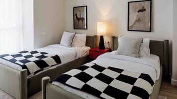 2 slaapkamers, een strijkplank/strijkijzer, gratis wifi, beddengoed