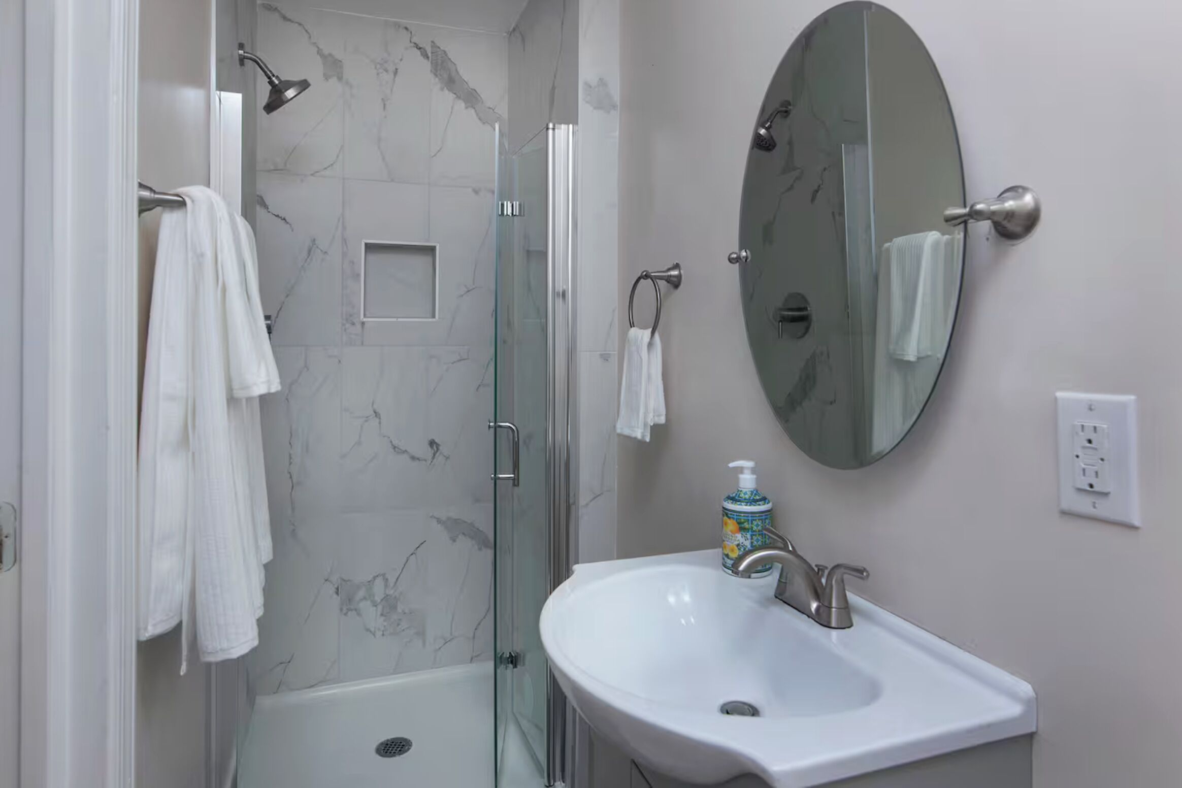 Shower, towels, soap, toilet paper