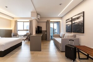 Studio | Living area | 42-inch Smart TV with digital channels - Pivô Jardins by Viva - Apartamentos Novos e Modernos (São Paulo)