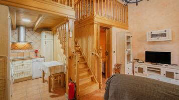 Tabla de planchar con plancha, wifi, ropa de cama