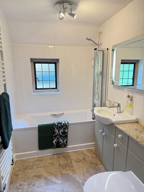 Hair dryer, towels, soap, shampoo
