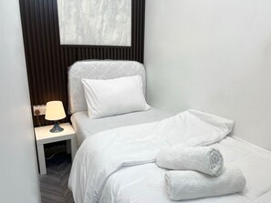 Economy Single Room, Balcony | Iron/ironing board, free WiFi - The Junction Partition Room in Tecom (Dubai)