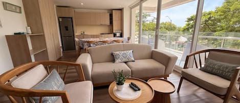 Deluxe Apartment, Balcony | Living area