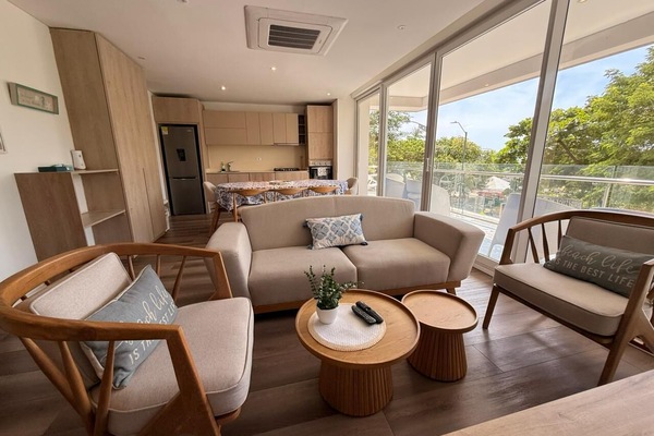Deluxe Apartment, Balcony | Living area | Flat-screen TV