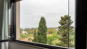 Double Room, Sea View | Minibar, in-room safe, desk, free WiFi