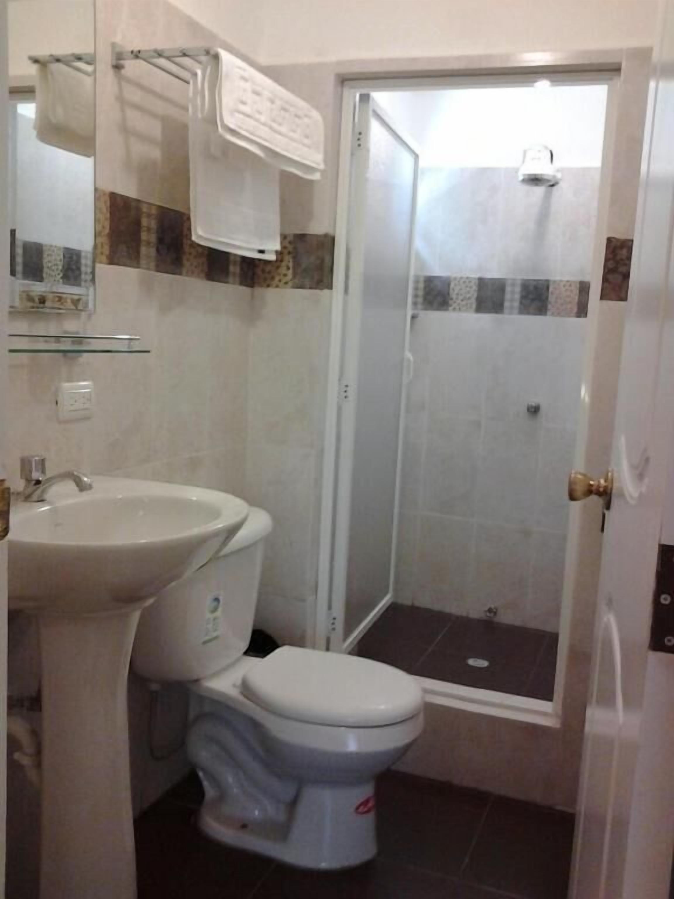 Family Room, Courtyard View | Bathroom | Shower, towels, soap, shampoo