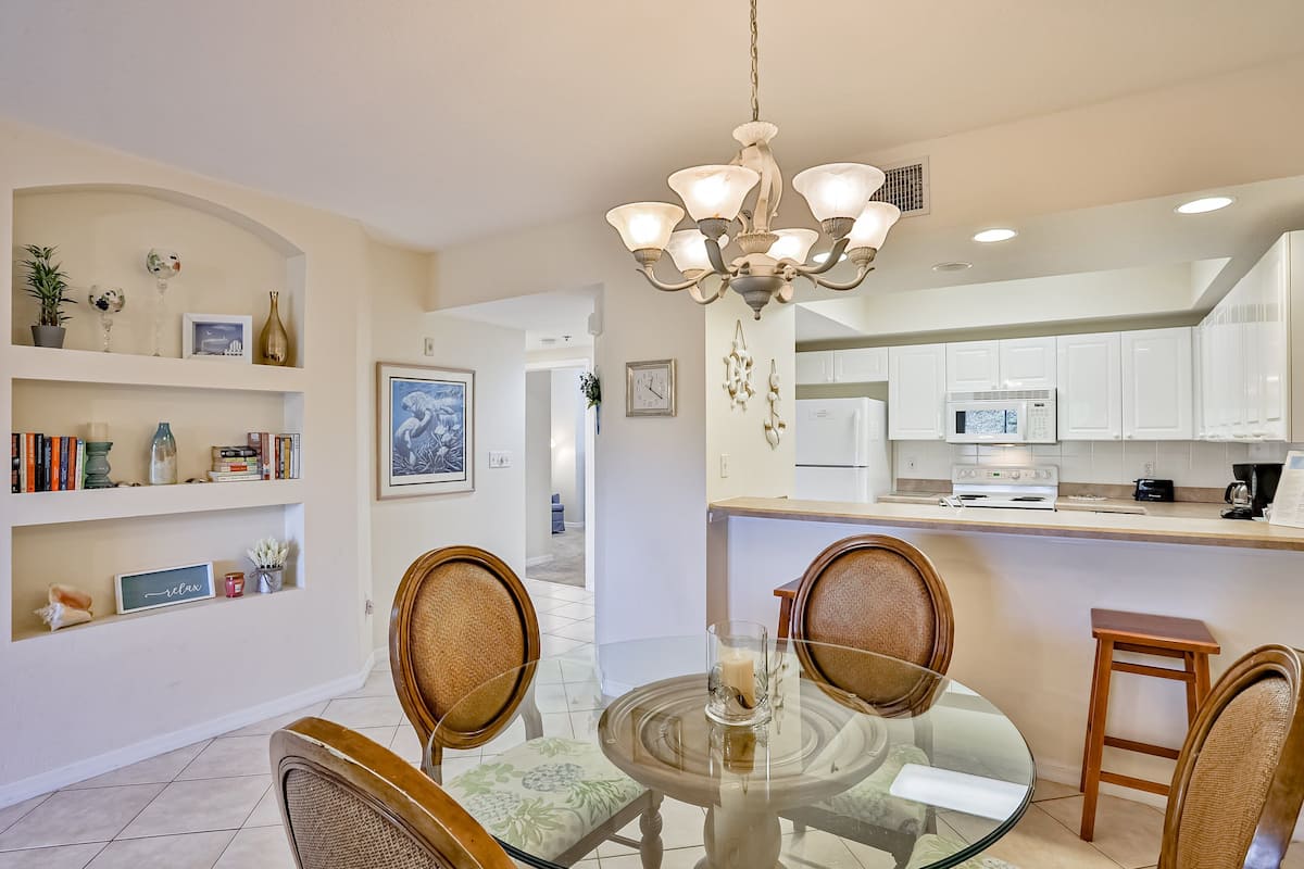 Condo, Multiple Beds, Pool Access, Garden View (NSB Oceanwalk 5-203) | 2 bedrooms, individually decorated, individually furnished, bed sheets