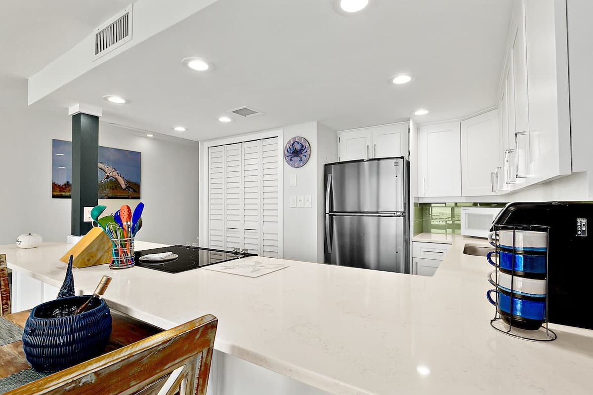 Condo, 1 King Bed with Sofa bed, Balcony, Ocean View (NSB Pelican 501A) | 1 bedroom, individually decorated, individually furnished, bed sheets