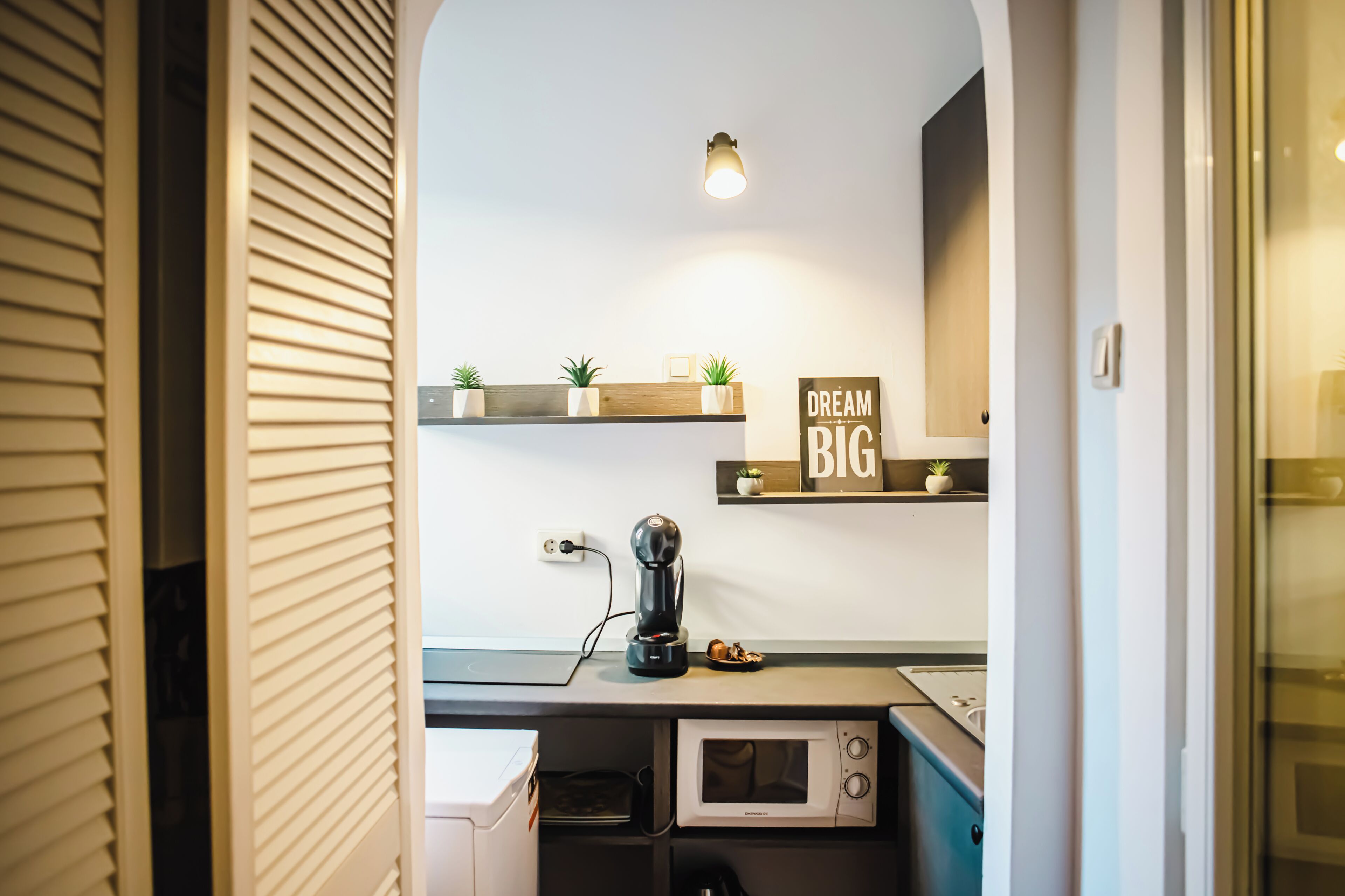Estúdio superior, cozinha americana, vista para a cidade | Cozinha privada | Máquina de café expresso, cafeteira/chaleira, chaleira elétrica