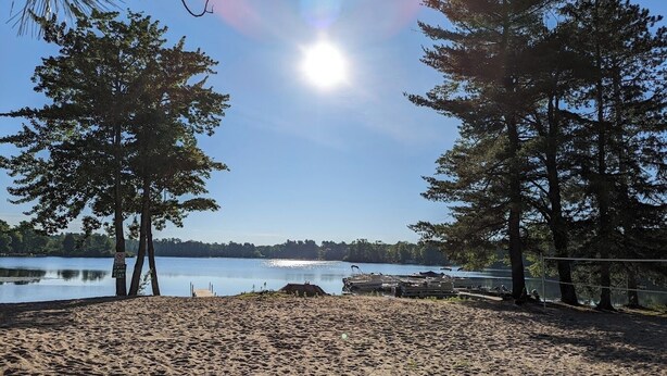 Beach - Wilson Lake Campground and Resort Lovely 2-bedroom cabin (Wild Rose)