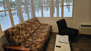 Living area - Wilson Lake Campground and Resort Lovely 2-bedroom cabin (Wild Rose)