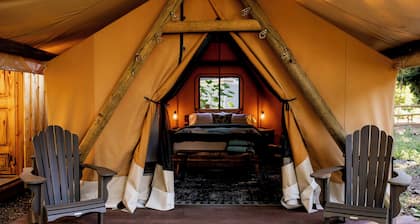 Year-round glamping retreat on a 50-acre Oregon farm. Private hot tub on a spring-fed duck pond, safari-style tent, sleeps 3-4, hand-fed alpacas and ducks. 90 min from Portland.