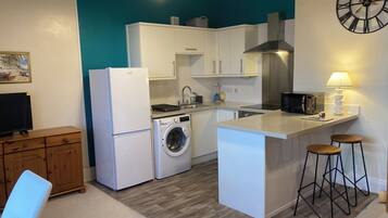 Leilighet, hageutsikt | Eget kjøkken | Høy barnestol