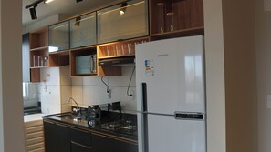 Microwave, stovetop - Cozy apartment just 3 minutes from the beach. Perfect for families. (São Luís)