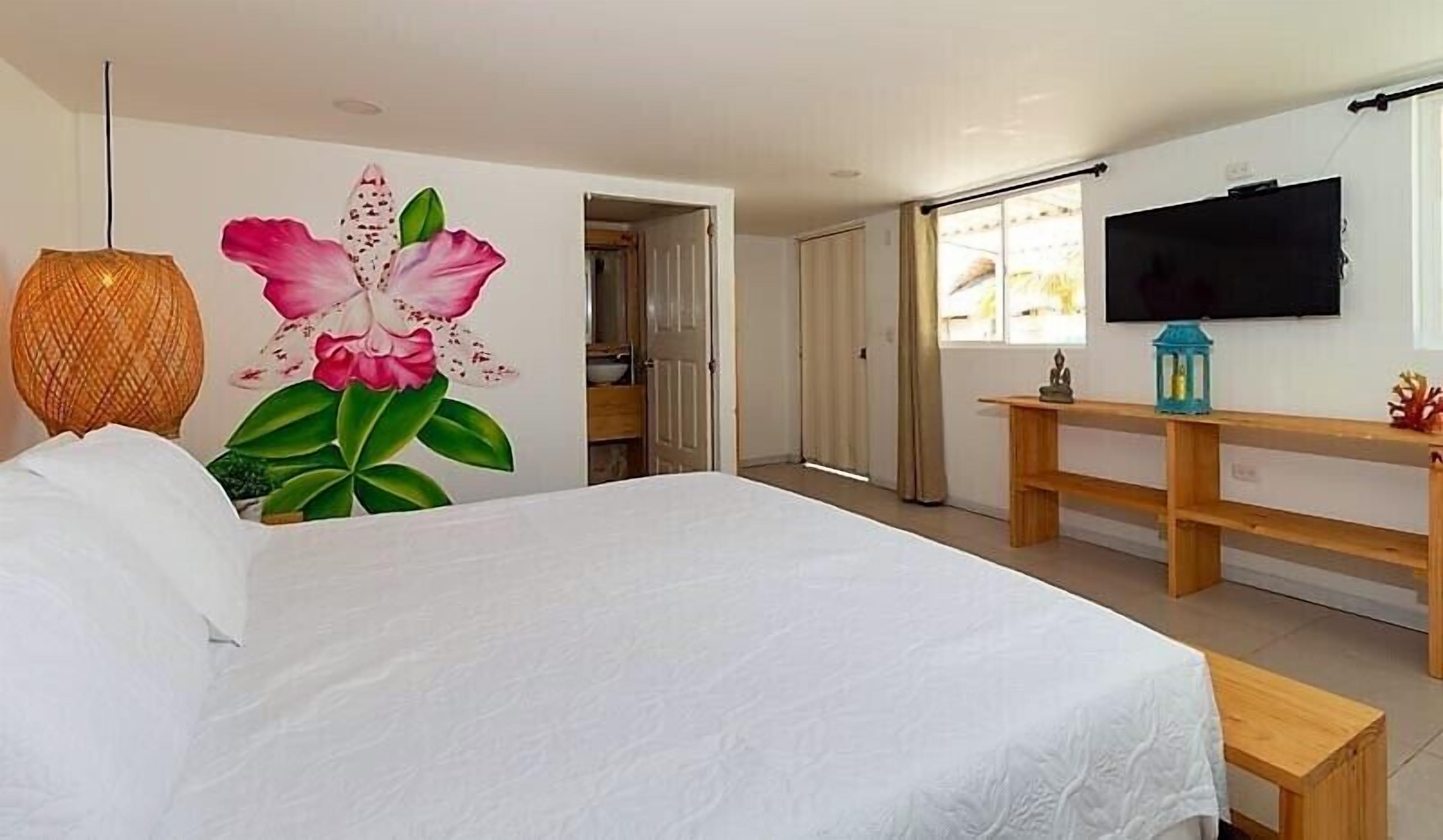 Comfort Room, 1 Queen Bed, Air conditioning, Garden View | Garden view