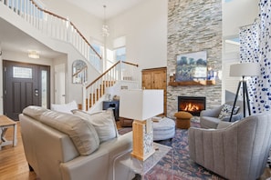 TV, fireplace - Modern 4 Bedroom Castle Rock Home (Castle Rock)