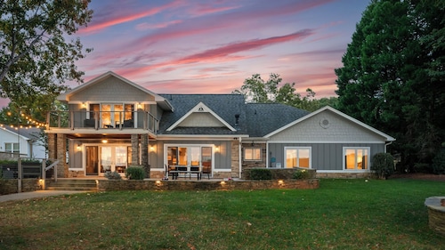 Lake Norman Lakefront w/ Private Beach, Dock, Hot Tub & Fire Pit Sandy Shore by Avantstay