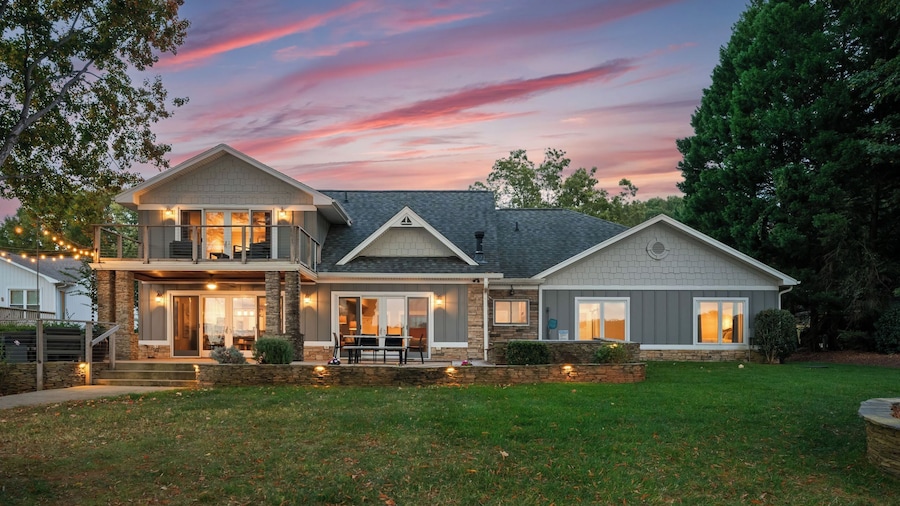 Lake Norman Lakefront w/ Private Beach, Dock, Hot Tub & Fire Pit Sandy Shore by Avantstay