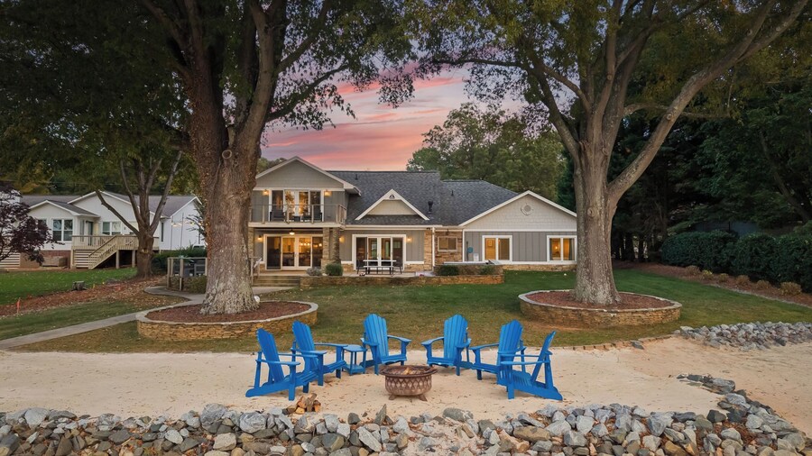 Lake Norman Lakefront w/ Private Beach, Dock, Hot Tub & Fire Pit Sandy Shore by Avantstay