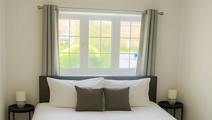 2 chambres, fer et planche à repasser, accès au Wi-Fi (inclus)