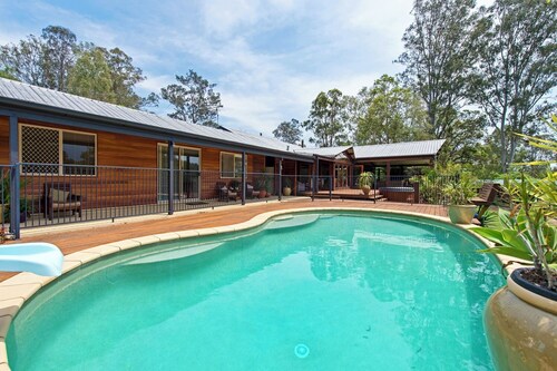 A cosy farmstay with dwarf goats, spa, pool, fire pit and other gourmet options.