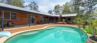 A cosy farmstay with dwarf goats, spa, pool, fire pit and other gourmet options.