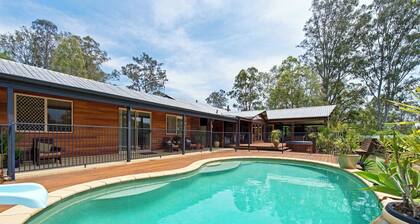 A cosy farmstay with dwarf goats, spa, pool, fire pit and other gourmet options.