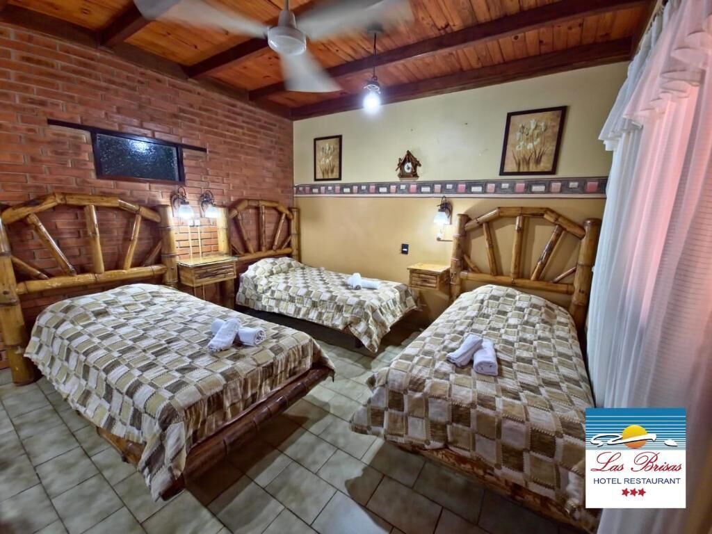 Superior Triple Room, Pool View | In-room safe, free WiFi