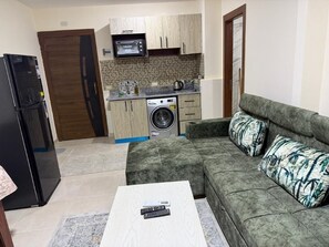 Quarto, 1 quarto, acessível, para fumantes | Área de estar