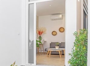 Appartement Confort | Coin séjour | Télévision à écran plat