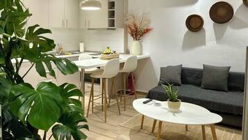 Comfort Apartment | Living area | Flat-screen TV