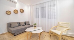 Comfort-Apartment | Wohnbereich | Flachbildfernseher