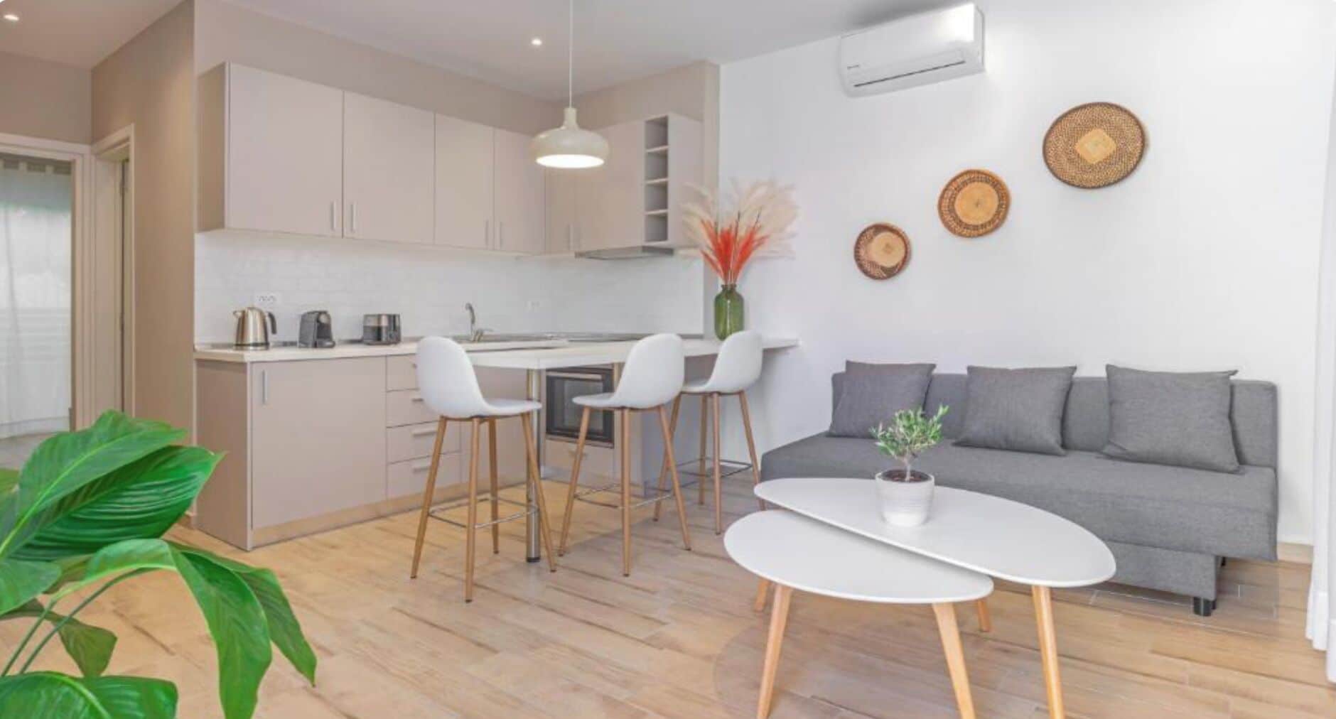 Departamento Confort | Área de sala de estar | Televisión de pantalla plana 