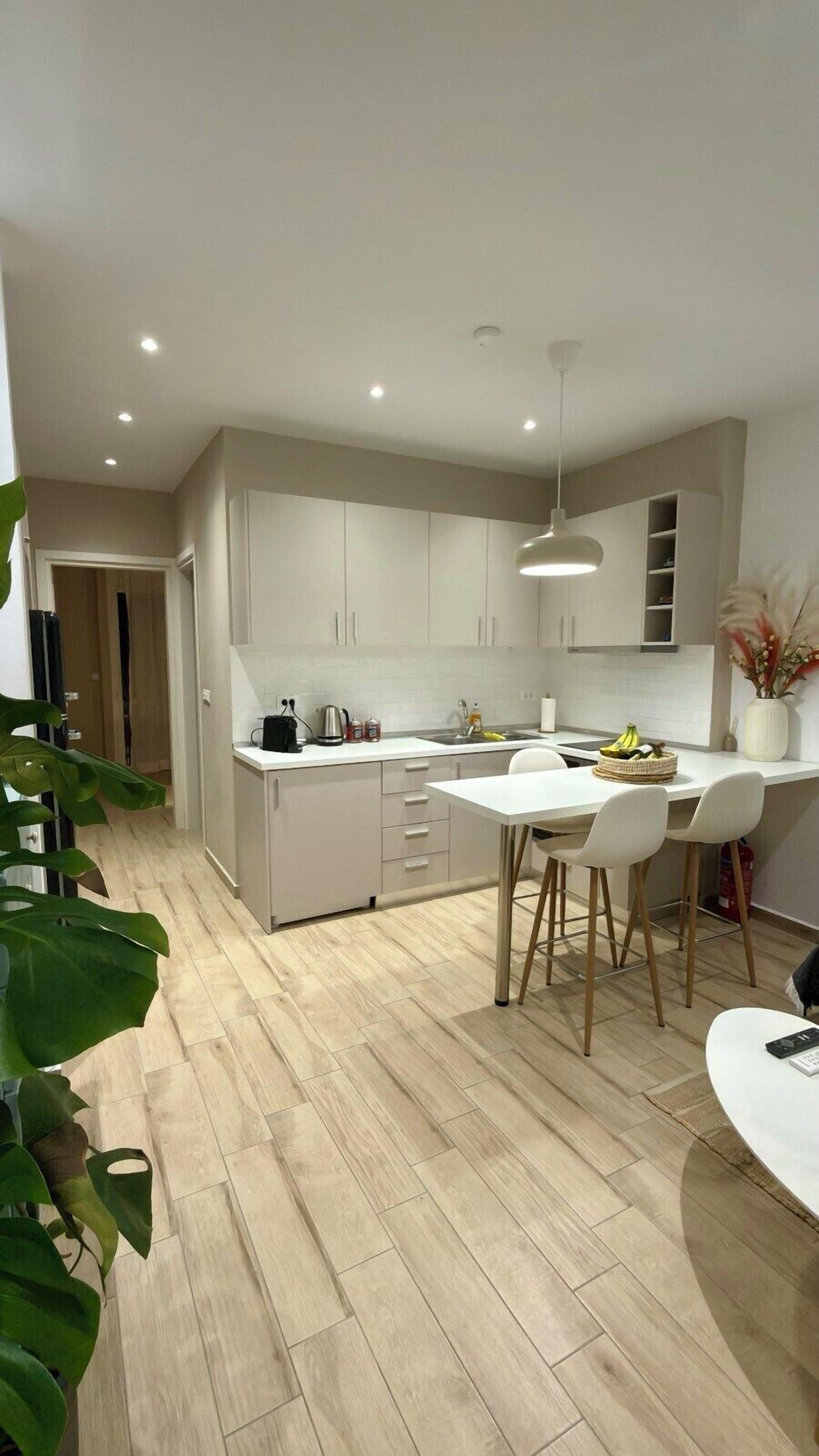 Comfort Apartment | Living area | Flat-screen TV