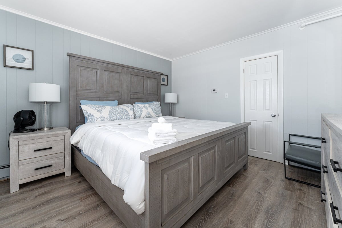 Desk, laptop workspace, blackout curtains, iron/ironing board