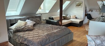 Top floor apartment in lovingly restored villa