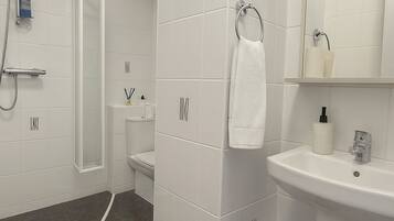 Shower, towels, soap, shampoo