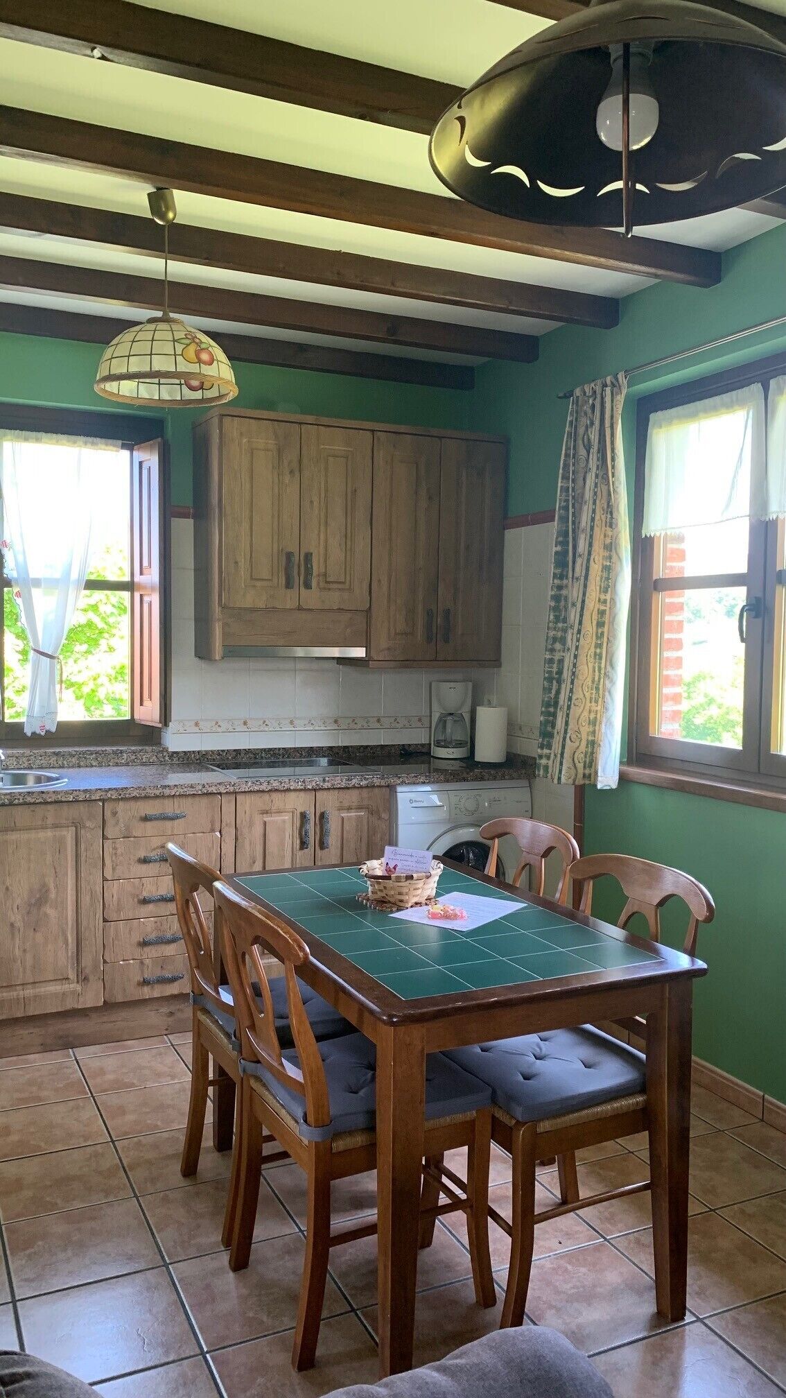 Apartamentos La Quintana de Romillo | Private kitchen | Fridge, microwave, stovetop, toaster