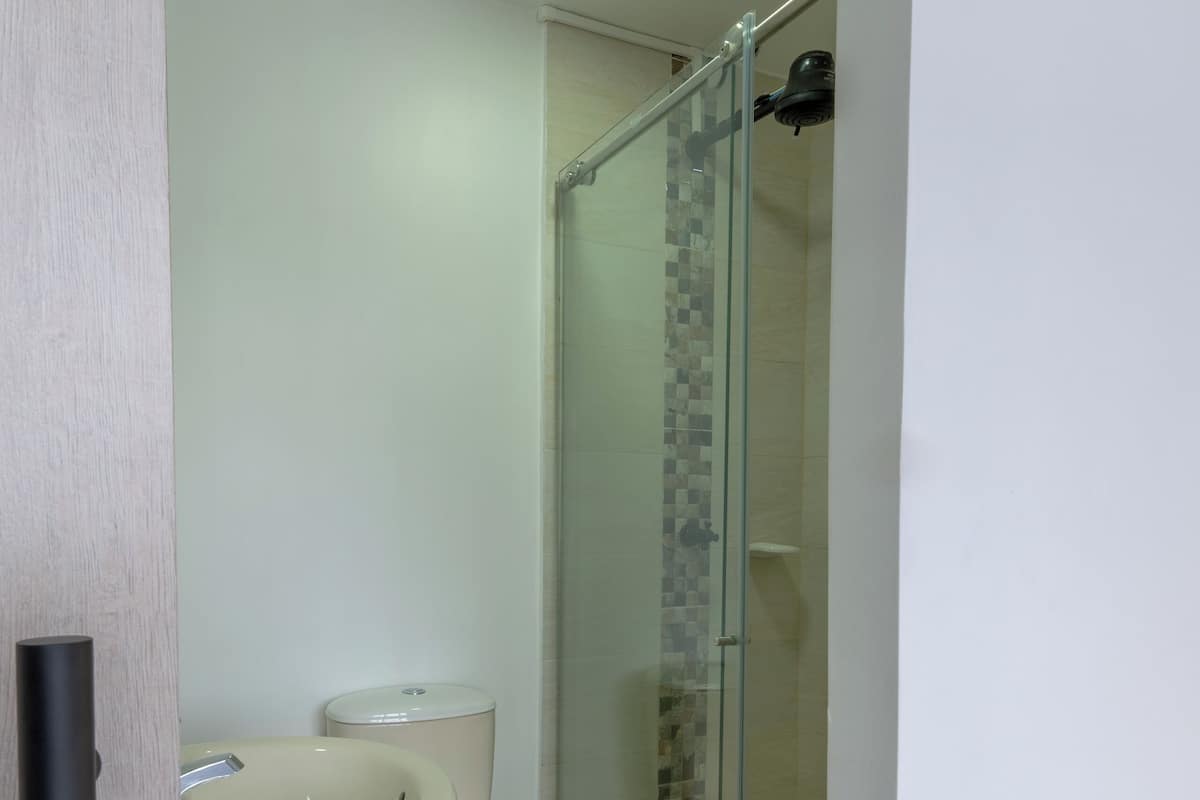 Standard Single Room | Bathroom | Shower, towels, soap, toilet paper