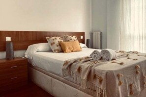 Tabla de planchar con plancha, Internet, ropa de cama