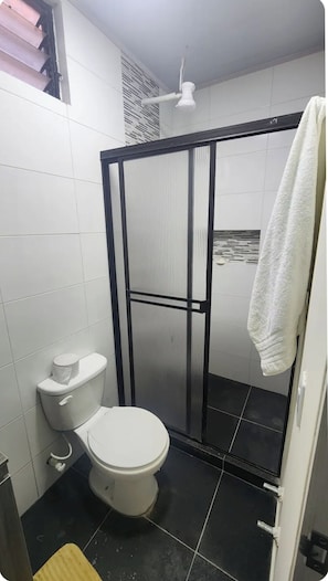 Shower, towels, soap, toilet paper
