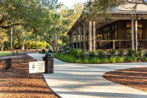 A covered outdoor area with a sign indicating the Nature Center is open daily. - 3 BD Sparrow Pond Cottage, Close to Beach, Community Pool, Privacy! Fun Decor! (Kiawah Island)