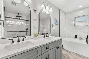 Shower, jetted tub, hair dryer, towels