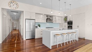 Coffee/tea maker, fridge, microwave, oven - Aerial Blue Mollymook - Ocean Views, Spacious, Wood Fireplace, Walk to Mollymook Beach & Golf Course (Mollymook)