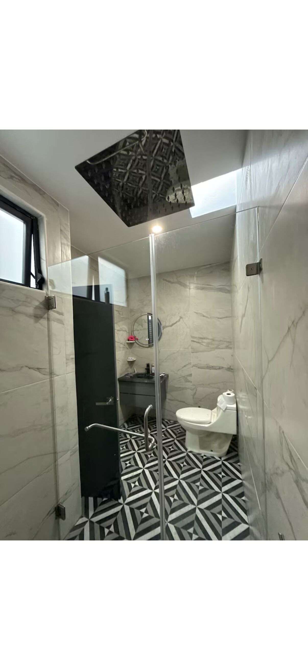 Shower, towels, soap, toilet paper