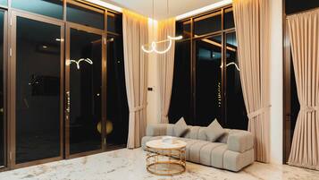 Suite, 1 kingsize bed | Woonruimte