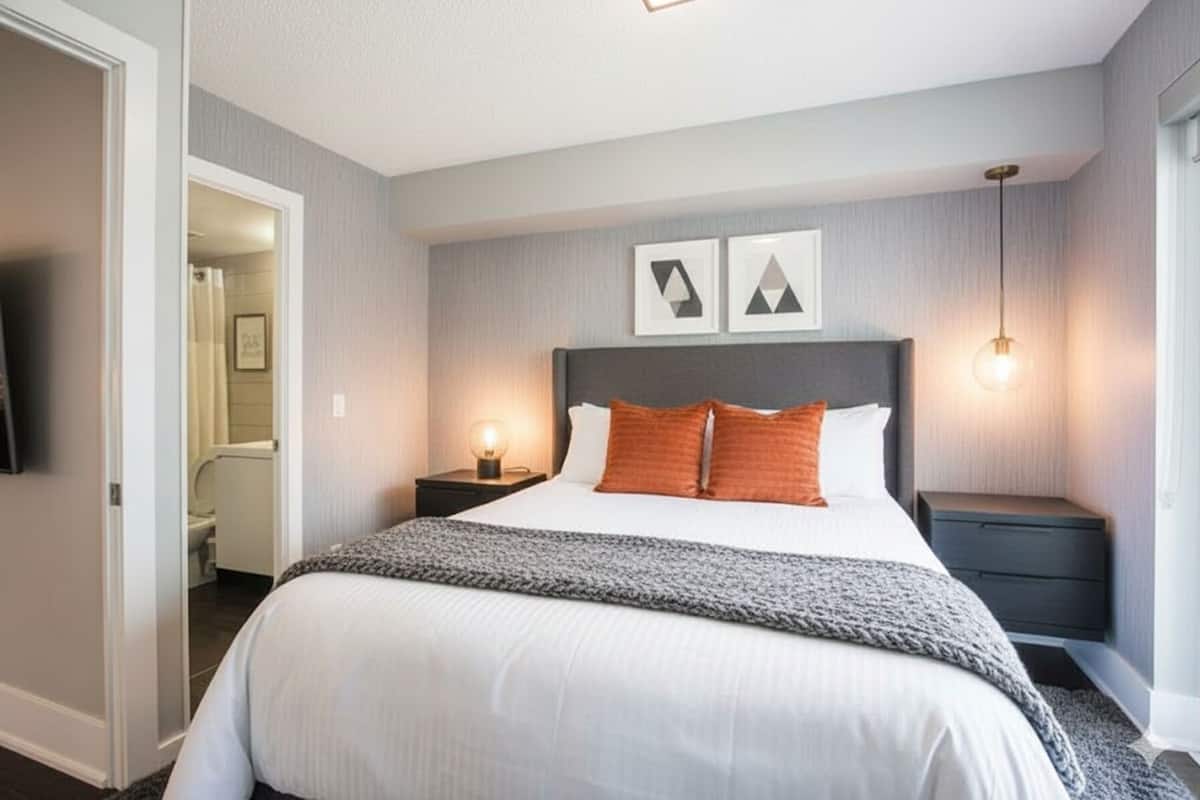 Familie suite, 3 slaapkamers, balkon, uitzicht op de stad | Een strijkplank/strijkijzer, gratis wifi