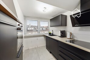 Mikrovågsugn, ugn, spishäll och diskmaskin