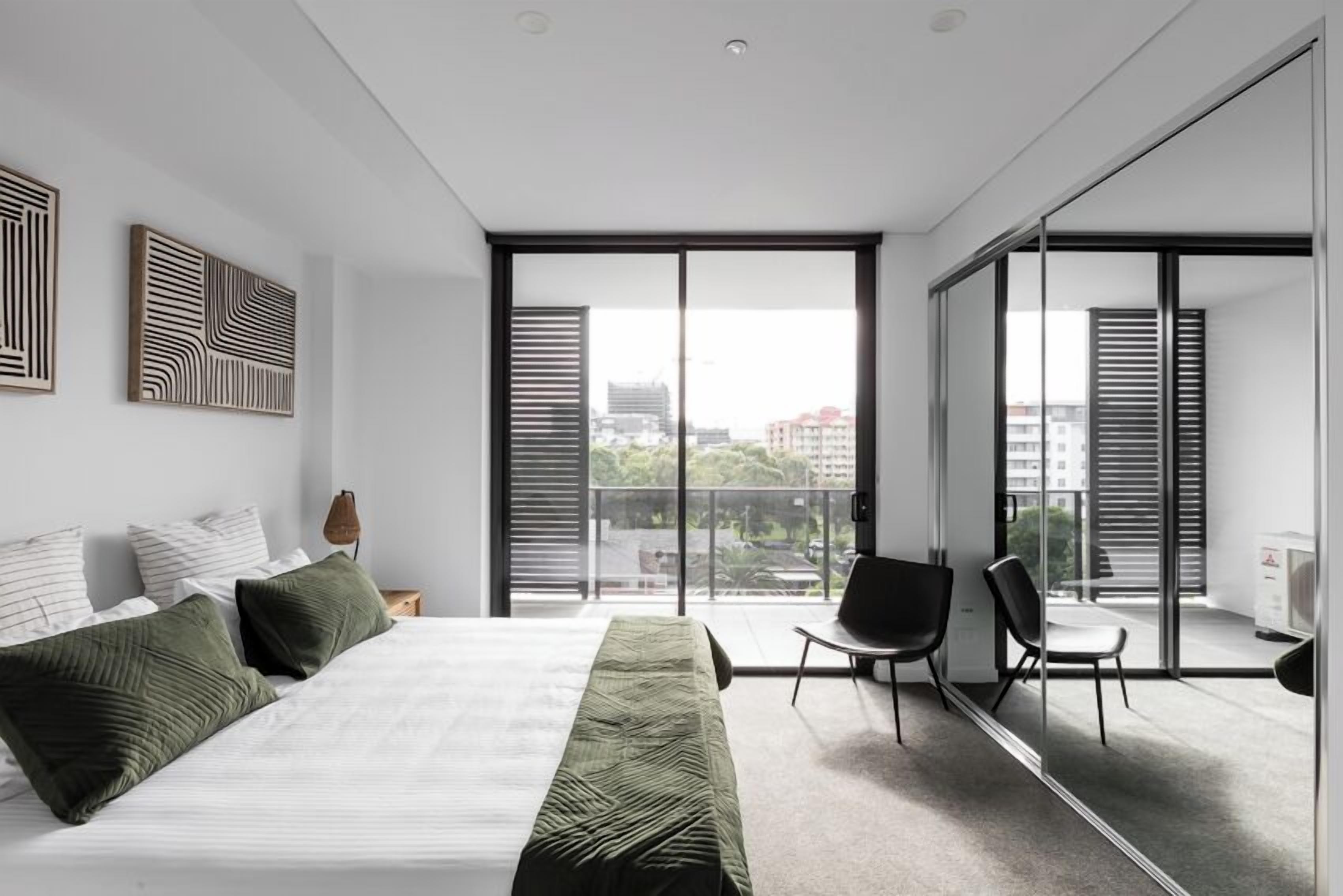 Desk, laptop workspace, blackout curtains, iron/ironing board